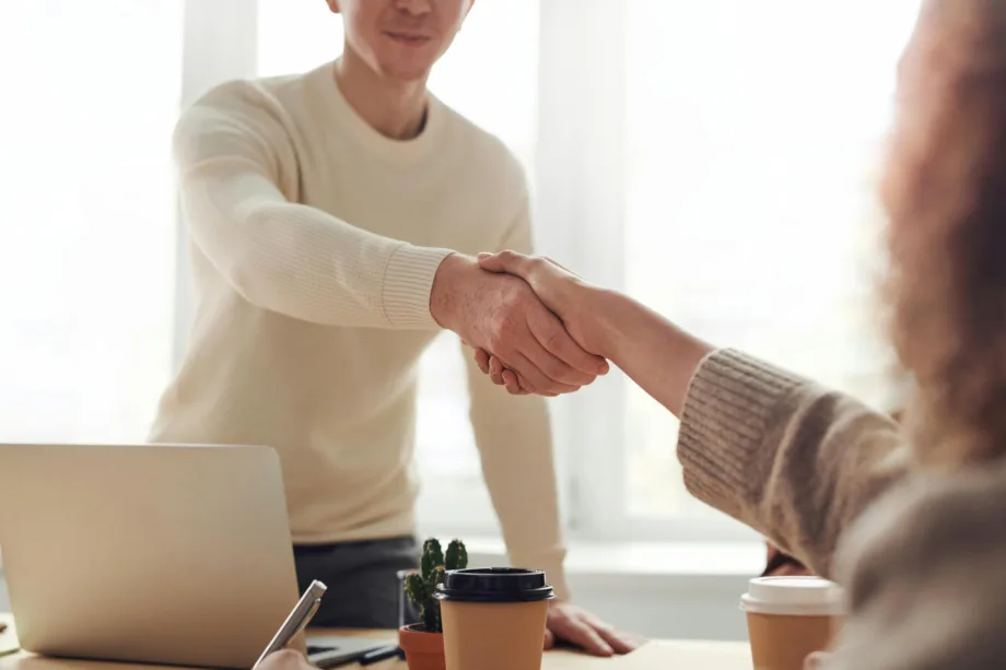 shaking hands in an office