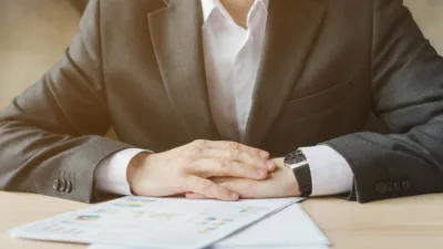 Fee-only financial advisor in St. Charles reviewing client financial planning documents at a desk